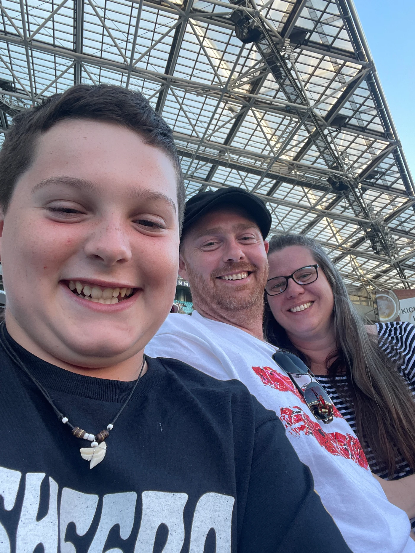 Malinda with her partner and stepson at a concert