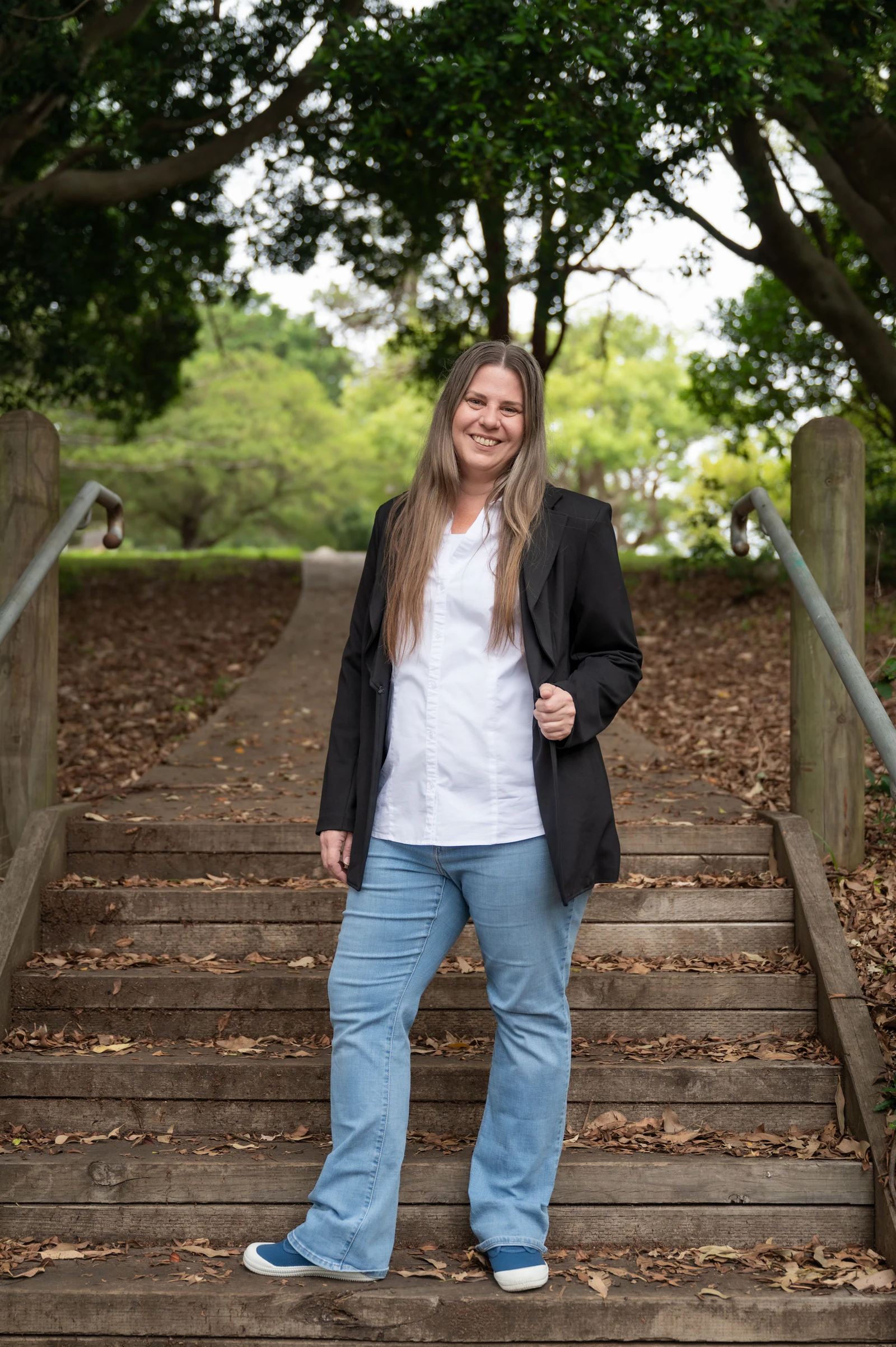 Malinda Sherrard standing on outdoor steps in Port Macquarie